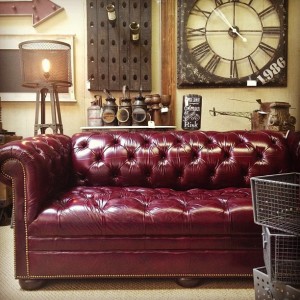 dark leather couch and wall